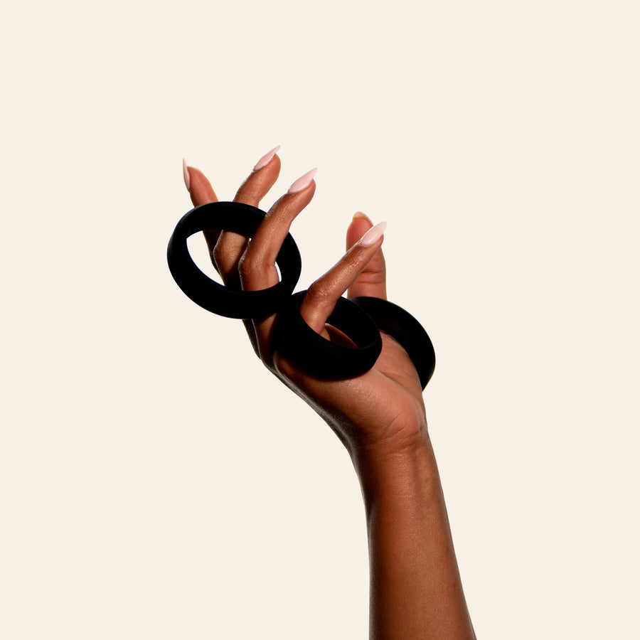 Women holding silicone cock rings